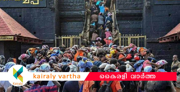 മണ്ഡലപൂജക്ക് ആറ് ദിവസം മാത്രം: ശബരിമലയിൽ വൻ തിരക്ക്; സൂര്യഗ്രഹണദിനം ദർശനത്തിന് നിയന്ത്രണം