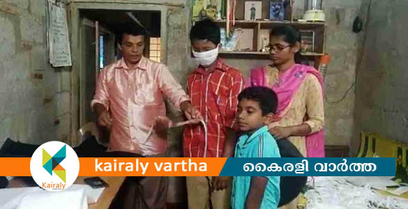 ദാരിദ്ര്യത്തിനിടയിലും മാസ്‌കുകള്‍ സൗജന്യമായി നിര്‍മിച്ച് നല്‍കി നാടിന് മാതൃകയായി ഒരു കുടുംബം