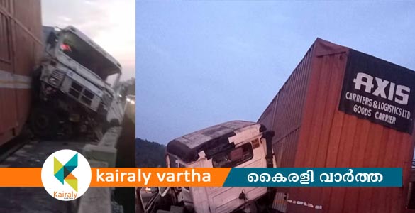 കണ്ടെയ്നർ ലോറി പാലത്തില്‍ ഇടിച്ച് അപകടം; കായലിൽ ചാടിയ ഡ്രൈവര്‍ കസ്റ്റഡിയിൽ