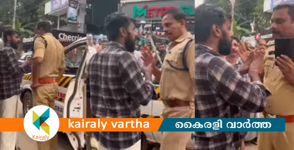 കണ്ണൂരില്‍ ഹെല്‍മറ്റ് വെക്കാത്തതിന് പിഴചുമത്തിയതിനെ ചൊല്ലി പൊലീസും യുവാവും തമ്മില്‍ തര്‍ക്കം